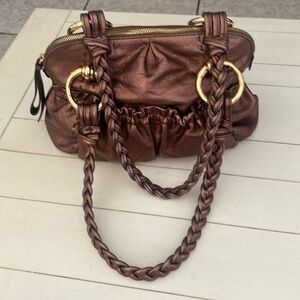 Bea Makowsky leather shoulder bag. Double braided straps with a 10” drop.